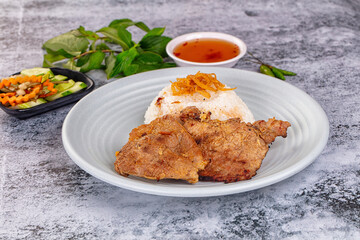 Roasted pork steak with rice