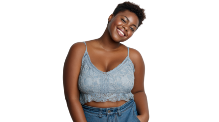 A joyful young woman smiling, wearing a modern outfit, on a white isolated background.