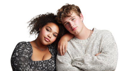 A young couple posing closely together, showcasing affection and connection, on a white isolated background.