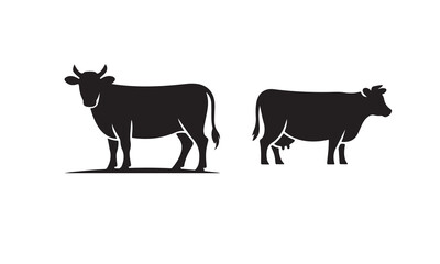 Simple black silhouette of a standing cow with udder on a white background