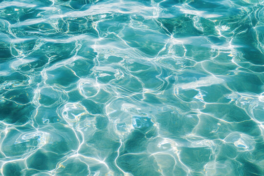 Bright natural sunlight dances across the calm turquoise water surface, creating beautiful shimmering patterns of pure light and refreshing clear reflections. - Powered by Adobe