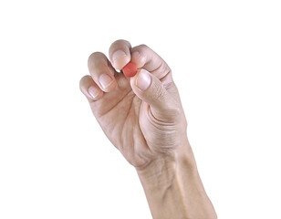 Human hand holding iron supplement, symbolizing recovery, healthcare, and treatment of iron deficiency.