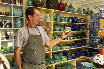 Artist in Ceramics and Pottery Studio working