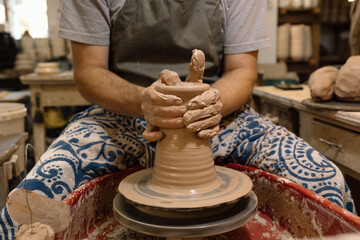 Artist in Ceramics and Pottery Studio working