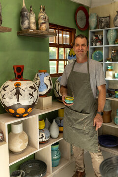 Artist in Ceramics and Pottery Studio working