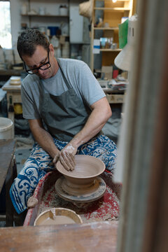 Artist in Ceramics and Pottery Studio working