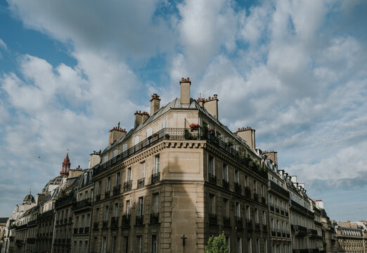 Traditional residential building with iron balconies in Paris, France.