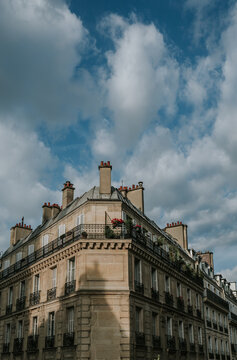 Traditional residential building with iron balconies in Paris, France.