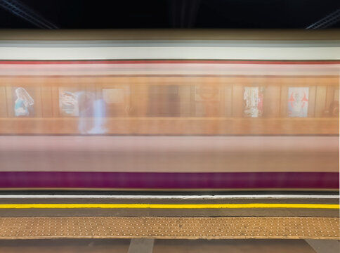 Motion blur of moving train of underground metro in London, UK.