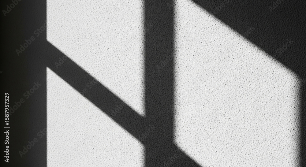 Poster abstract geometric shadow patterns cast on a textured white wall creating a stark contrast between l