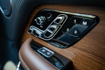 Luxury Car Interior Features Indulge in an Ergonomically Designed Control Panel complemented by a...