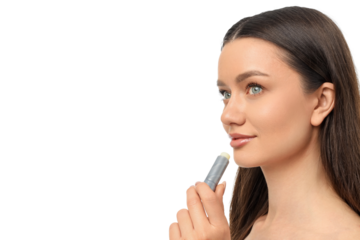 Woman applying lip balm, looking curious, isolated on white, PNG