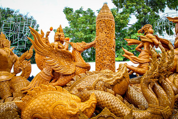 Buddhist Lent tradition, a beautiful display of wisdom, beeswax candles create art as a Buddhist...