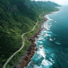 Winding coastal road through lush green hills