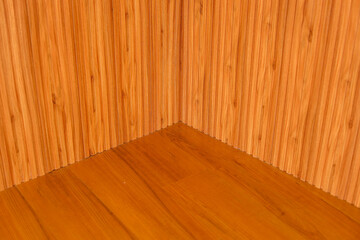 High Angle View Of Wooden Floor And Wall Creating A Corner