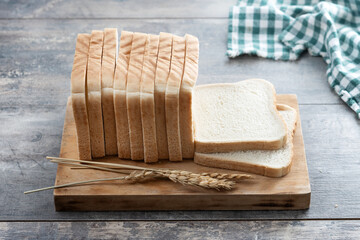 Sliced of White Bread on wooden table