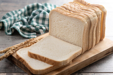 Sliced of White Bread on wooden table