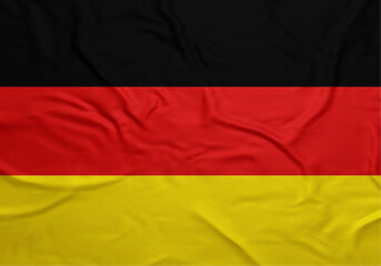 Waving german flag with black red and yellow horizontal stripes on fabric