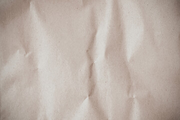 Naklejka premium Crumpled brown paper texture background for design with copy space for text or image. 