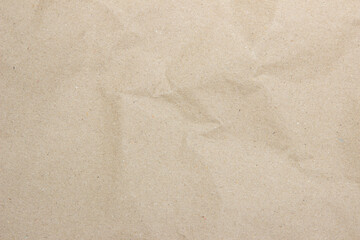Crumpled brown paper texture background for design with copy space for text or image.	