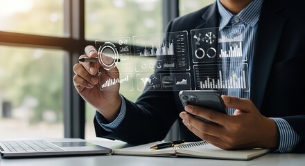 Businessman interacting with futuristic holographic data displays showing financial charts and graphs