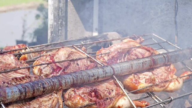 Roasted suckling pig on the spit in the market.
