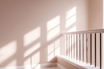 Fototapeta premium Soft sunlight casts gentle shadows on a minimalist staircase with white railing, creating a serene and inviting atmosphere in the interior space