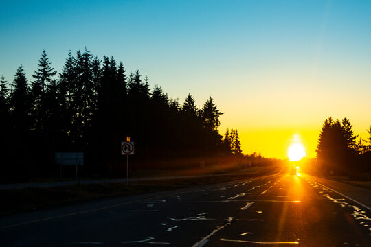 Sun setting over Highway 101 in Sequim, Washington state.