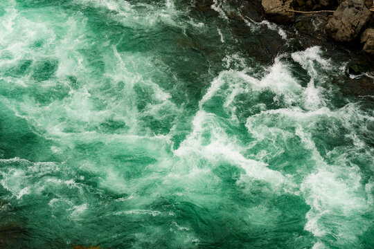 Foaming flowing river water, whitewater, the Elwha River, Port Angeles.