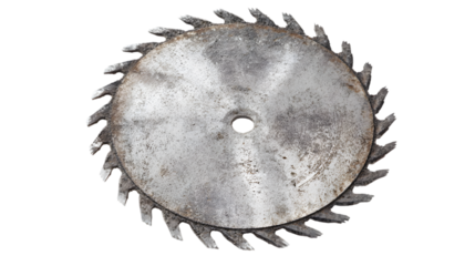 Close up of a circular saw blade showing its teeth and center hole against a black background