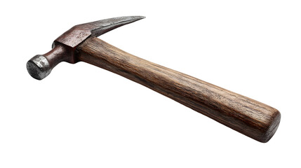 A slightly rusted metal hammer with a wooden handle isolated against a black background image view