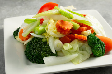 A view of a plate of steamed vegetables.