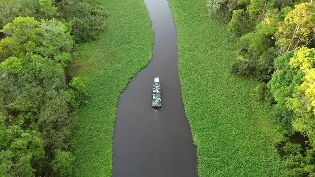 Serene view of a boat on the Amazon River in Peru