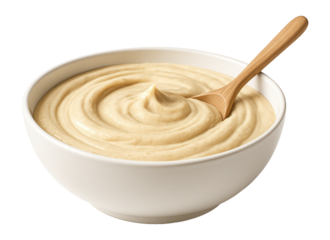 Rolled egg noodle dough, partially sliced, on a wooden butcher block