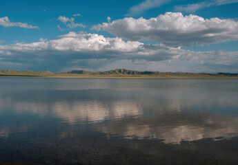 A calm and peaceful natural landscape, this high-mountain Lake Tuzkol or Salt Lake with healing...