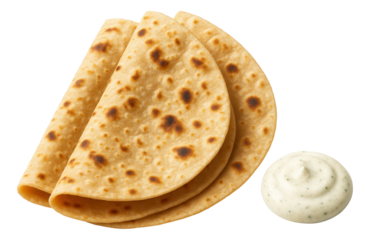 Small, round wicker basket on a white tablecloth, holding a collection of rustic breadsticks