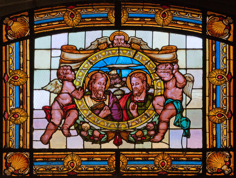 FLORENCE, ITALY - MARCH 18, 2025: The St. Simon and Jude the apostles in the baroque stained glass in the chruch Chiesa di San Simone e Giuda by unknown arist.