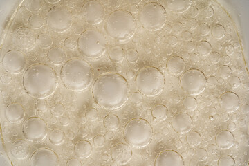 Macro view of oil bubbles forming abstract patterns