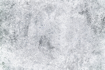 Textured concrete surface with detailed imperfections and mottled appearance
