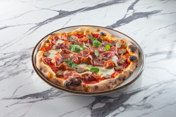 A view of an Italian meaty pizza.