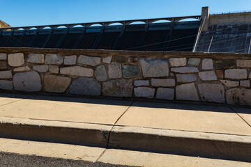 Grand Coulee Dam, view of the solid sloping concrete wall and parapet