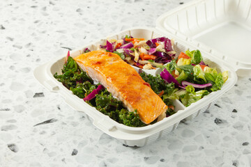 A view of a salmon salad entree.