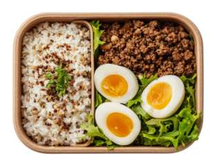 Healthy bento box lunch with rice ground meat boiled eggs and greens isolated on transparent background