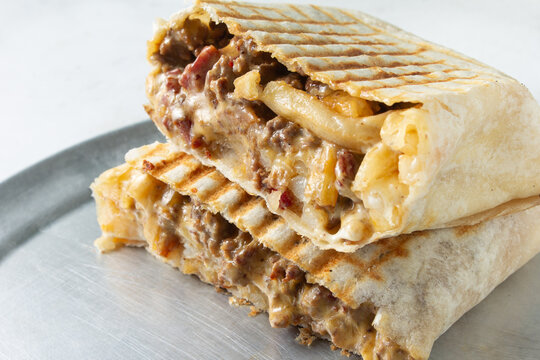 A closeup view of a French taco.