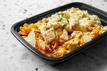 A view of a meal prep entree of chicken parmesan.