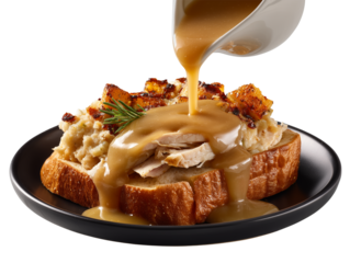 Delicious open faced turkey sandwich with stuffing and gravy isolated on transparent background