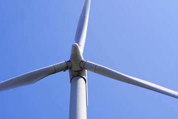 renewable energies. close up of windmill with blue sky
