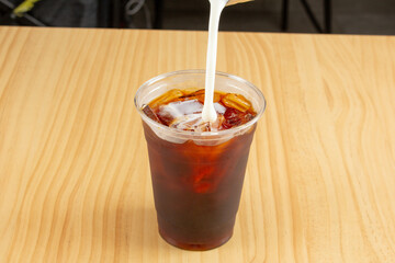 A view of the process of making a cold brew latte.