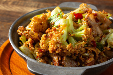 A closeup view of a entree called dry pot cauliflower.