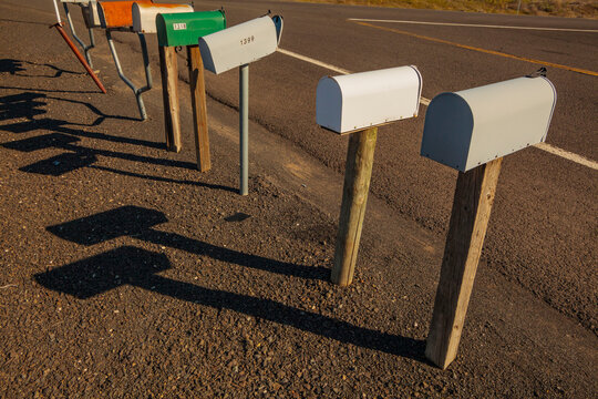 Rural route mail boxes by the side of the road.